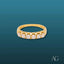 Elegant 18k gold ring featuring five round diamonds and six white cubic zirconias