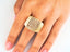 Elegant 18k yellow gold ring featuring a lattice pattern for timeless sophistication