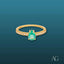 Elegant 18k Gold Ring with Pear-Shaped Green Emerald and Diamond Accents