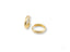 Two gold wedding bands highlighting the beauty of 18k yellow gold craftsmanship