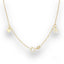 Delicate gold anklet with heart and flower charms, crafted in 18k gold
