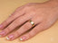 Gold ring on finger showcasing Essence Linea 6mm Ring, bold minimal art gold jewelry