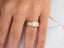Two-tone Eternal Duo Wedding Band with Diamonds in White Gold on a finger
