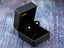 Heart-shaped stud earrings in a black box, Eternal Heart stud in solid 18k gold