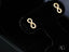 Eternal Spark 18K Gold Infinity CZ Earrings featuring a stylish infinity symbol design