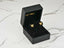 Gold CZ butterfly earrings in a black jewelry box, Ethereal Wings collection