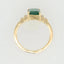 18k Gold Ring with 2.3ct Emerald and Diamond Halo.