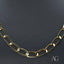 Exquisite Art Gold 18k gold chain with elegant links, 25-inch length, and luxurious design.