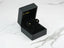 Black jewelry box showcasing Golden Brilliance 18k Gold CZ Round Stud Earrings