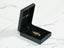 Black jewelry box showcasing a stunning 18k gold Golden Cherish pendant ring