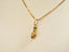 Golden Flip Flop Pendant in 18k Gold on a stylish chain necklace