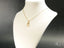 18k Gold Golden Grace Lady Pendant Necklace on white jewelry bust for personal milestones