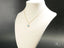 Delicate 18K gold chain necklace featuring a light blue Evil Eye pendant from Golden Guardian