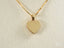 Elegant 18k Gold Heart Pendant on a delicate chain necklace for timeless beauty