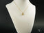 18k Gold Golden Heart Pendant Necklace on a delicate chain with round charm