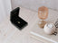 Black jewelry box with 18k gold Golden Heart Pendant and ring inside