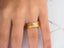 Gold wedding band set with diamond accent, featuring 14k gold craftsmanship