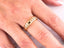 Gold ring with a latticed pattern showcasing Golden Mesh Elegance in 18k gold