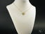 Gold heart pendant necklace on delicate chain for Golden Paws pet lovers