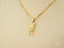 Gold pendant necklace with crystal accents from Golden Play, crafted in 18k gold