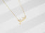 Golden Signature Necklace with custom name in 18k or 14k gold, elegant boxer-style chain.