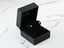 Silver stud earrings in a black jewelry box, featuring 18K White Gold 5mm Ball Earrings