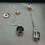 18k white gold earrings with green tourmaline, elegant design, Boston craftsmanship.