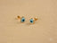 Two heart-shaped evil eye earrings in 18k gold for protection and style