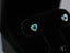 Heart-shaped evil eye earrings in 18k gold for protection and love