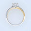 Harmonious 18k white and yellow gold ring with 1 carat diamond.