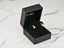 Pearl drop earrings in a black jewelry box, featuring Love’s Elegance 18K gold heart design