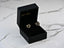 Heart-shaped gold earrings in a black box, Lustrous Love, radiant 18k gold jewelry