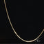 Luxurious 14k gold box chain necklace featuring an elegant AG pendant charm