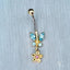 Luxury topaz bellybutton piercing in 18k gold featuring vibrant gemstones.
