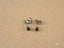 Noir Elegance: 18k White Gold Black Diamond Stud Earrings in art gold jewelry design