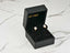 Petal Fantasy 18K Gold Flower CZ Earrings in a stylish black jewelry box