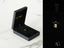 Black jewelry box with 18k gold ring inside Petite Lock Small Locker Pendant