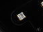 Radiant Luxe earrings featuring stunning square-cut cubic zirconia in 18k gold square settings