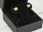Gold butterfly earrings in a black jewelry box for the Rainbow Flutter collection