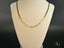 Gold mariner link chain from Regal Brilliance 18K Yellow Gold Piastrine Flat Necklace