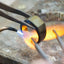 Metal ring heating with flame for Art Gold jewelry repair in gold jewelry restoration