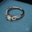 Romantic 18k rose gold diamond ring with 0.5 ct gemstone, symbolizing eternal love and elegance.