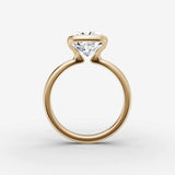 Demi cushion diamond setting in gold, profile angle
