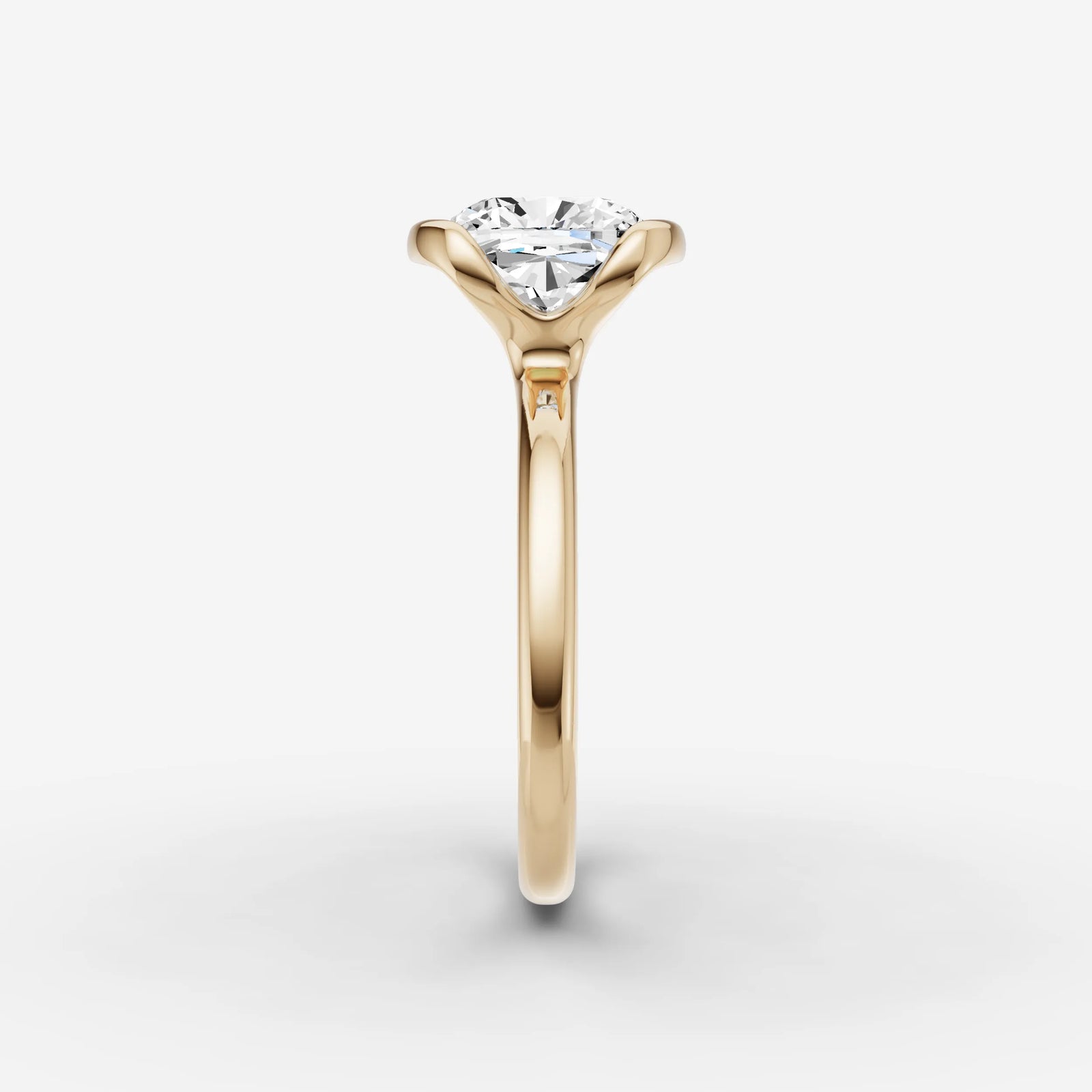 Demi cushion diamond setting in gold, angled view