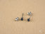 Silver stud earrings featuring dark blue stones in 18k White Gold Sapphire Earrings
