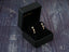 Elegant Stars Drop Earrings in certified 18k solid gold inside a black jewelry box