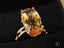 Gold ring in 18K solid gold featuring a large multi-toned gemstone, art gold jewelry