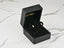 Gold stud earrings in a black jewelry box for Timeless Allure freshwater pearl stud collection
