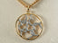 18k Gold and diamond heart pendant with abstract bird design, Timeless Love collection