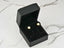 Pearl stud earrings in a black jewelry box, part of Timeless Radiance Gold Jewelry